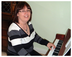 Piano Teacher playing piano